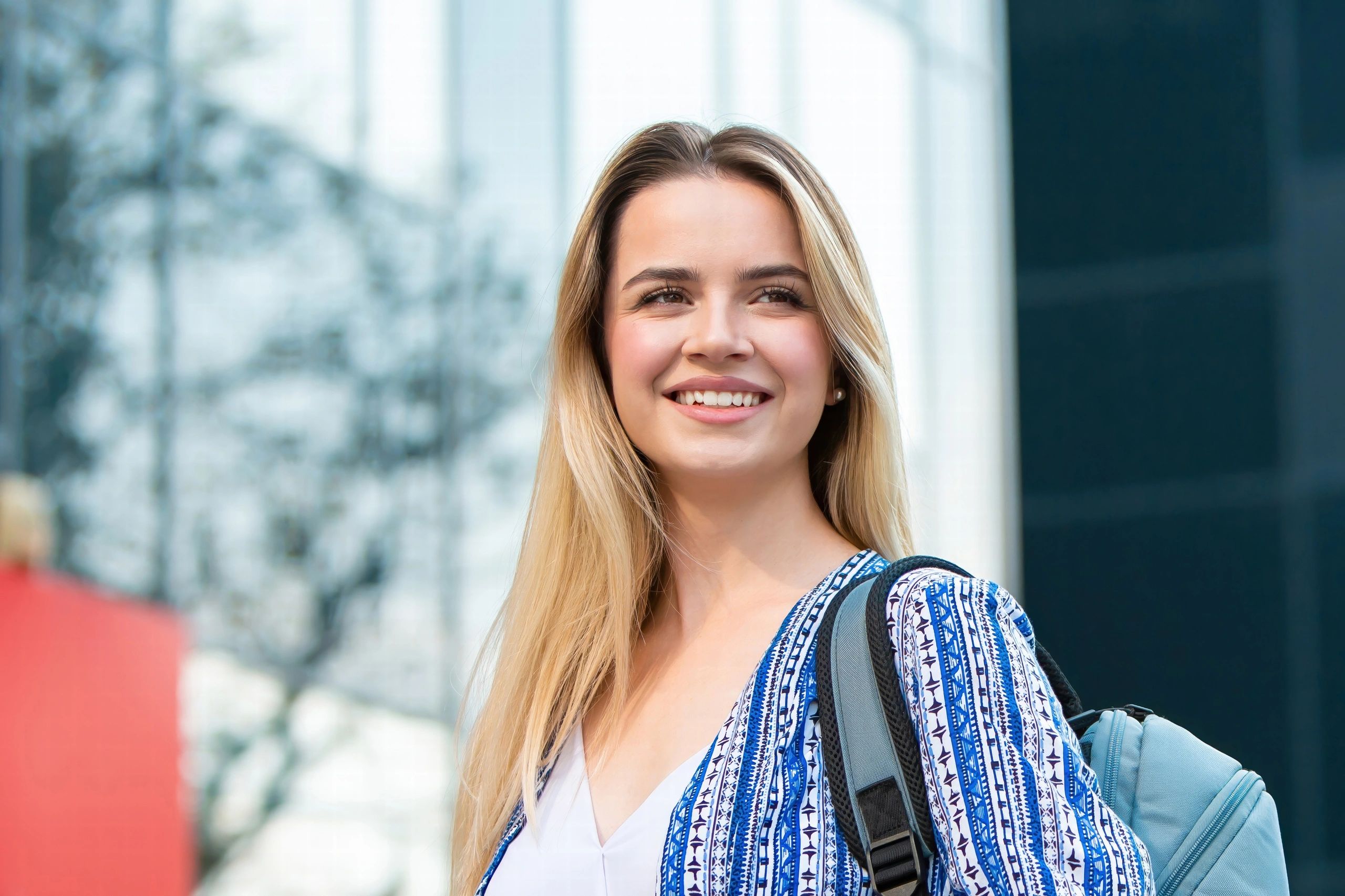 Student smiling on campus